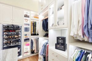 Custom closet design showing custom shelving and cabinetry