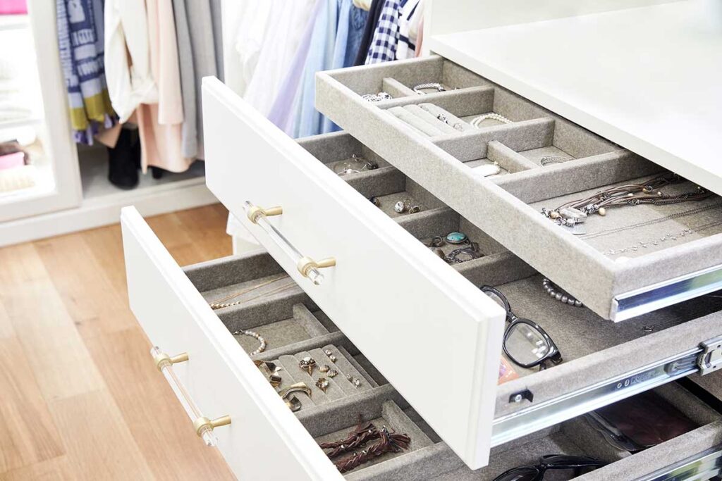 Custom closet built-in featuring jewelry drawers