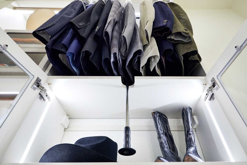 Custom closet built-in showing hanging clothes