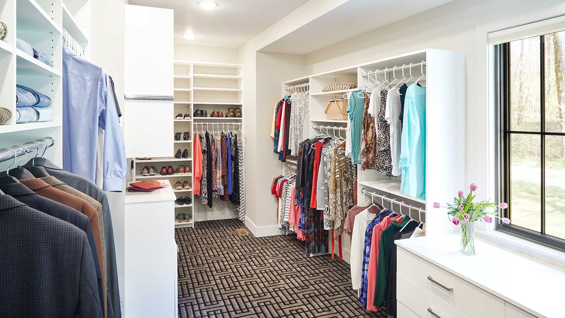 Custom closet built-in showing clothes and shoe racks