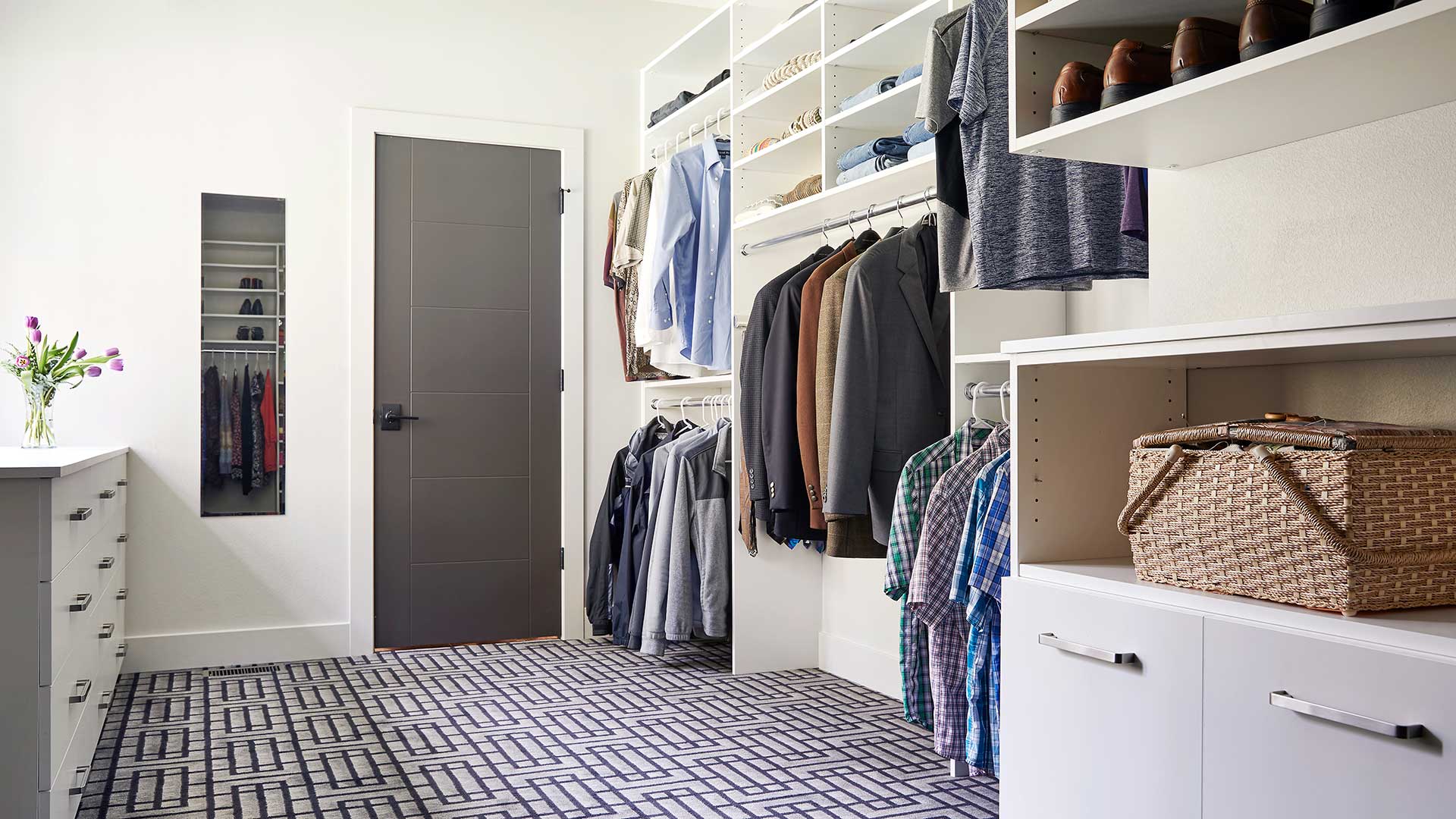 Custom closet built-in showing hanging clothes and shelving