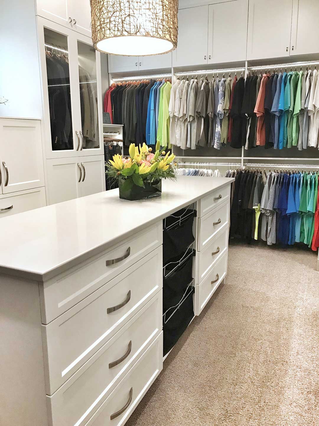 Custom closet built-in featuring center dresser