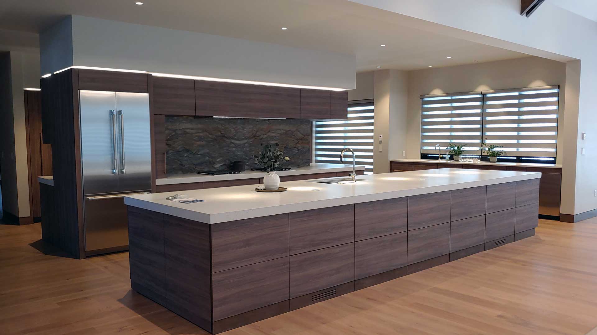 Modern kitchen with clean lines featuring bar