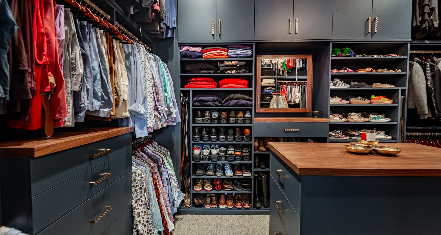Modern and dramatic closet shelving and cabinetry