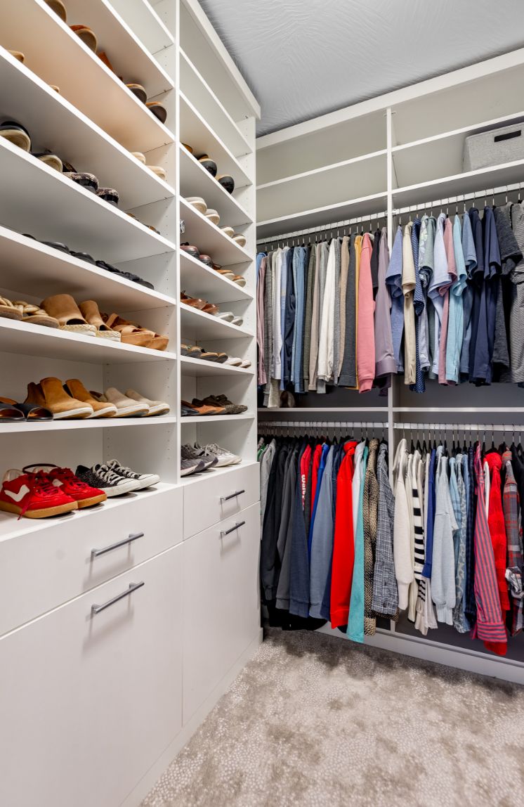 Closet with drying racks with dual hanging rods vertical