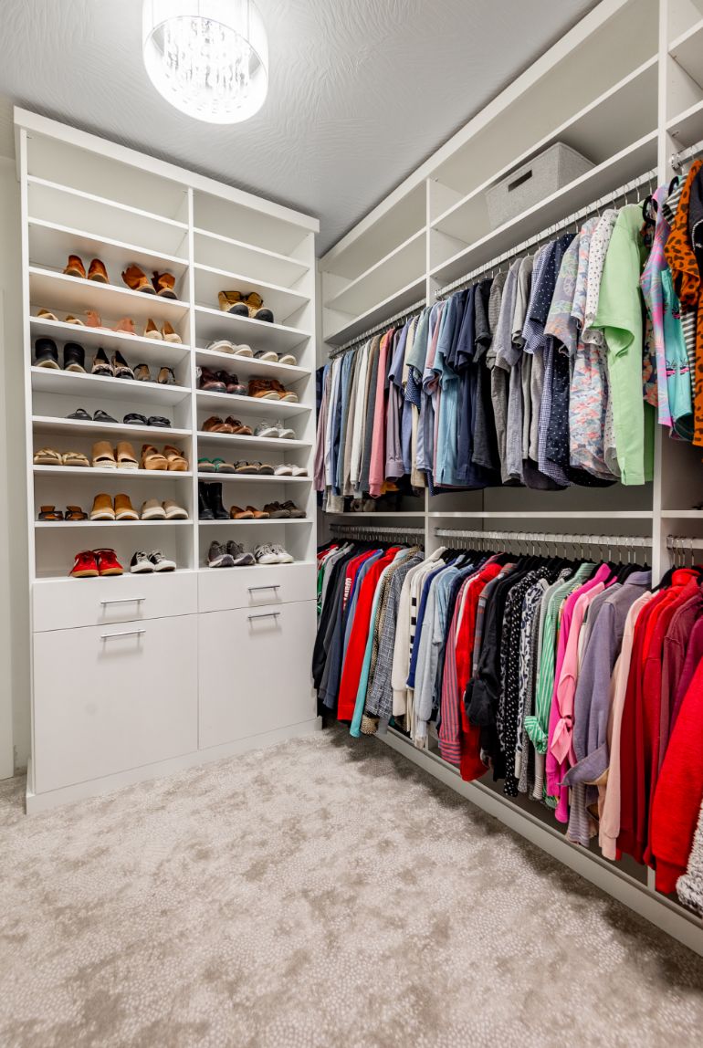 Closet with drying racks featuring shoe rack vertical