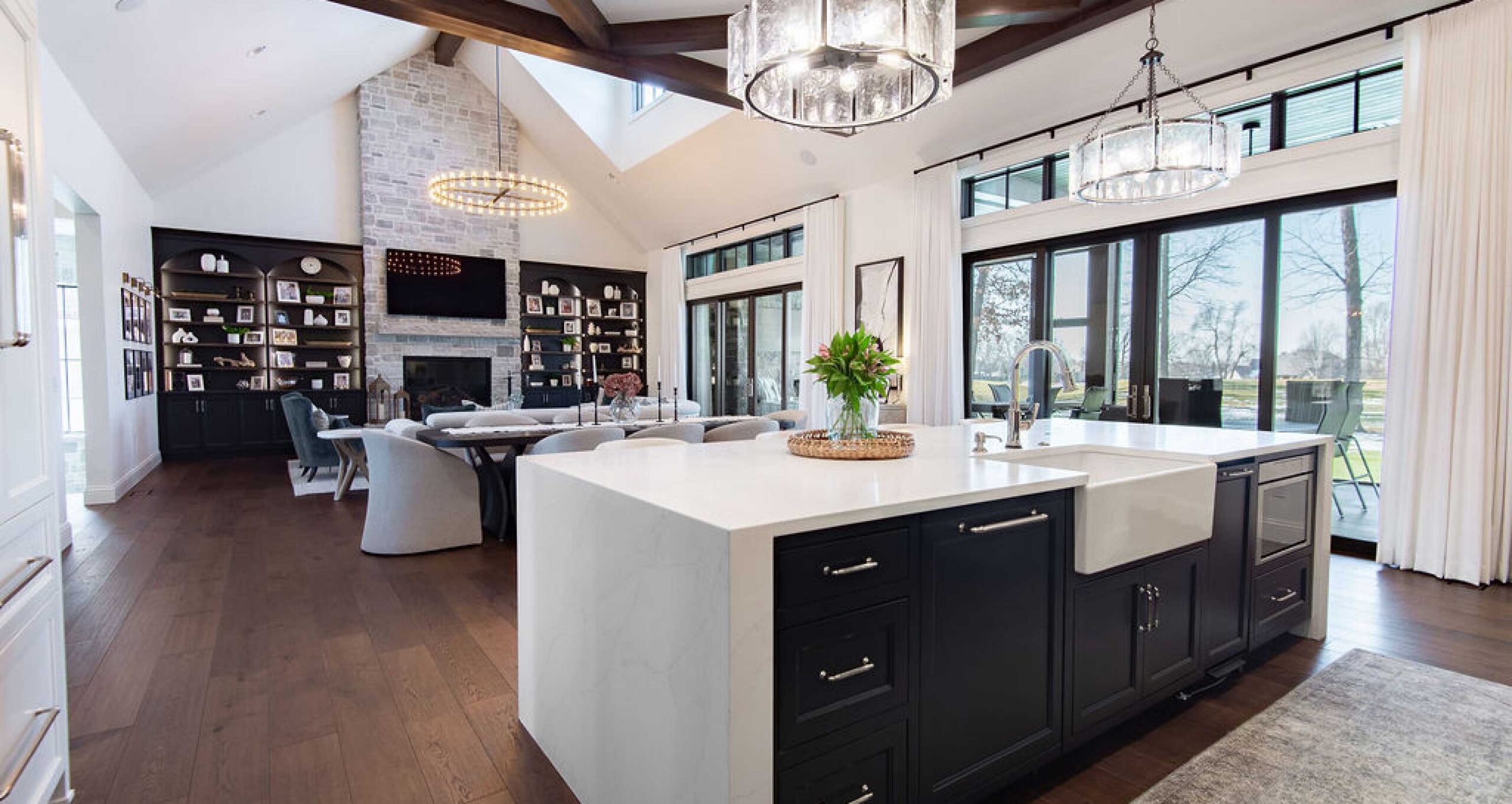 Elegant and open kitchen with bar detail
